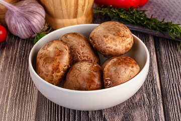Raw brown champignon heap for cooking