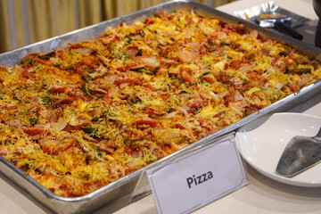 Freshly baked pizza, captured on March 12, 2025. Crispy crust topped with rich sauce, melted cheese, and flavorful toppings, creating a delicious and satisfying meal