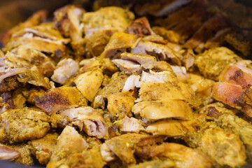 Traditional Indonesian chicken dish, captured on March 12, 2025. Tender chicken cooked with rich spices and herbs, creating a flavorful and aromatic meal