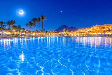 Obraz premium Night Pool Resort Moonlit Scene