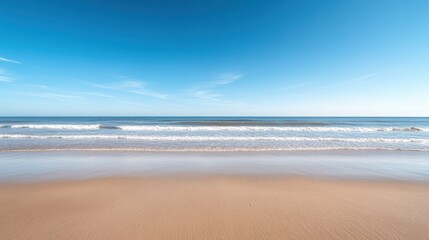 Tranquil ocean waves softly caressing the sunlit shore, setting a peaceful and idyllic scene ideal for summer getaways and travel spots