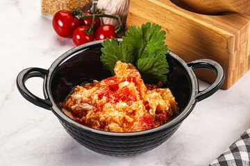 Shakshuka with tomato for breakfast
