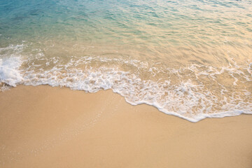 nature of the beach and sea Summer with sunshine, sandy beaches, clear blue waters sparkling against the blue sky. On an island with good ecology and environment Background for summer vacation