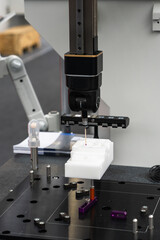 Infrared sensor for measuring parts. Quality evaluation on a modern factory.