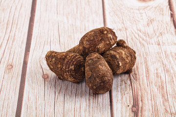 Brown topinambur roots for cooking