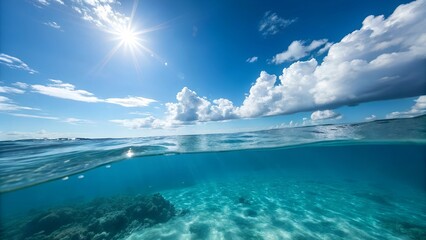 Fototapeta premium Blue summer skies with white clouds meet the calm ocean horizon