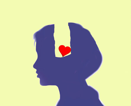 Silhouette of a female profile with a heart symbolizing love and relationships