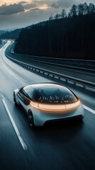Obraz premium Futuristic Car on Highway: A sleek, modern car, showcasing an innovative design with smooth lines and advanced technology, speeds along a highway towards a distant horizon. 