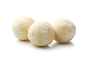 Fototapeta premium Three Isolated Macadamia Nuts with Shells on White Background