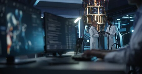 Female and Male Engineers Working in an Advanced Lab. Technician and Manager Discussing Quantum Computing Technology for Medical Research. Molecular Modelling Software Working on Computer Screen - Powered by Adobe