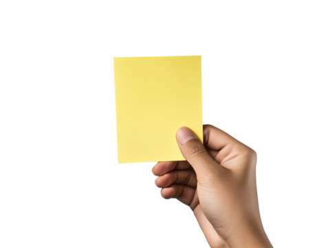 hand holding yellow sticky note