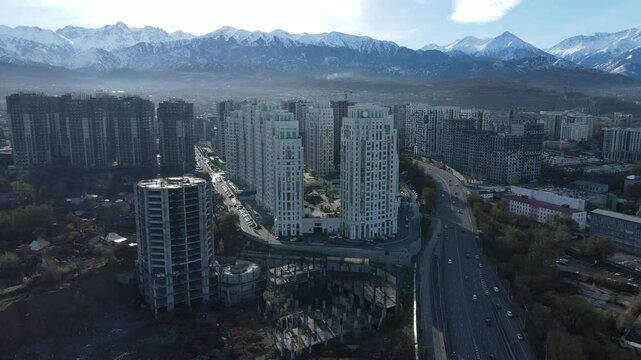 Almaty Cityscape with Smog Esentai Mall, Church, and Kok Tobe View winter