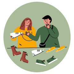 Happy couple choosing stylish shoes