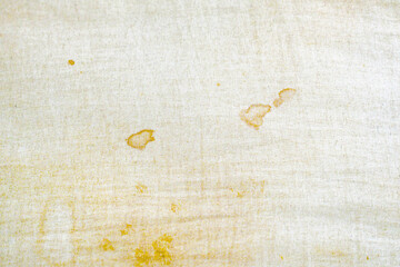 Dirty old pillow with yellow stains. Unclean mattress fabric clothes.