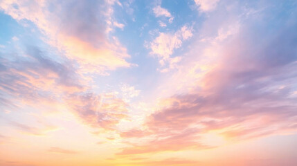 Obraz premium A breathtaking sunrise sky, soft pastel colors blending from pink to orange to pale blue