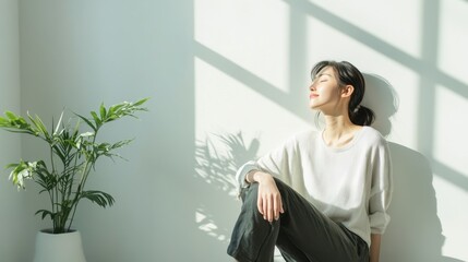 Woman taking break bright room clean background  copy space