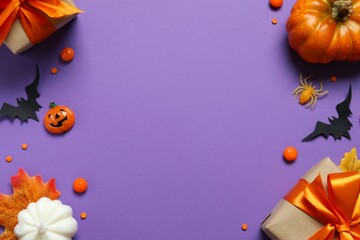 Fototapeta premium Halloween holiday decorations including gift boxes, pumpkins, spiders, bats on color background