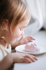 little girl and healthy easter sweets - jelly bunny