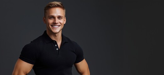 Obraz premium Smiling young man in black polo shirt with muscular build against dark background
