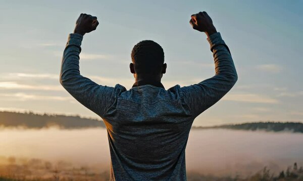 Man Celebrates Victory at Sunrise