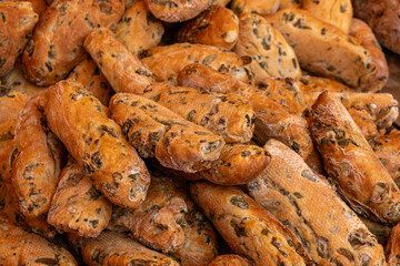 Freshly Baked Olive Bread Rolls at a Bakery Market Stall