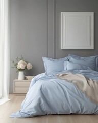 Serene bedroom interior with light blue bedding, gray walls, and a blank frame.
