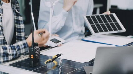 Business person meeting on solar cell panel technology. Business People Discussing Solar Power Environment Concept