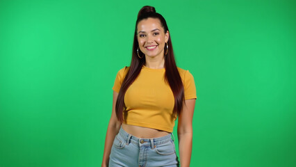 trendy woman stands confidently vibrant green backdrop showcasing stylish fashion sense