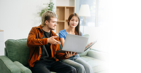 Explore vibrant teamwork, creativity, and learning with young adults using laptops and headphones