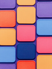 Colorful square tiles arranged in vibrant pattern