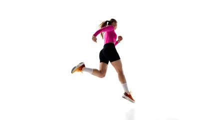 Low angle back view image of competitive female runner in motion, training, showing endurance...