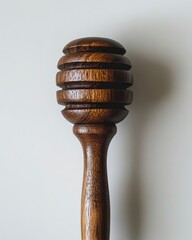 Rustic Wooden Honey Dipper on a Clean White Backdrop Close Up Shot of a Traditional Kitchen Utensil