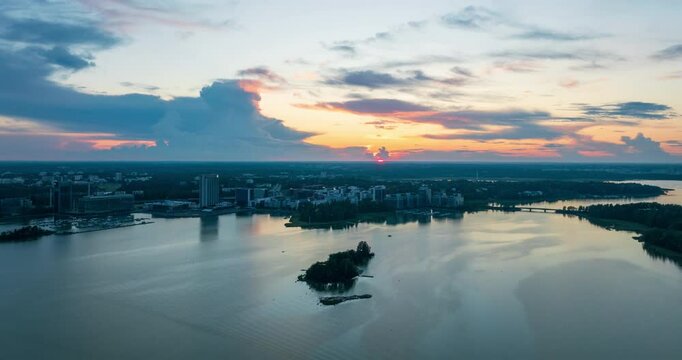 Aerial hyperlapse moving sideways in front of the Keilaniemi area, dusk in Espoo