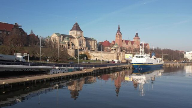 Szczecin Waterfront: Reflected Architecture and Ship on a Sunny Day. Chrobry Embankment, Haken Terrace.