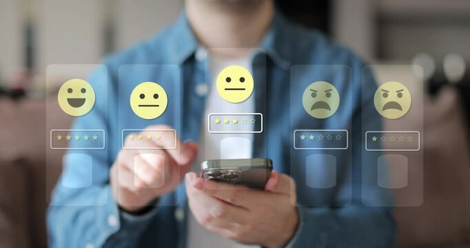 Close-up of man hands using smartphone, rating of the quality of service,store, service and social networks. Satisfaction survey concept reviews customer quality assessment.