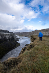 Walking along the canyon at Dettifoss in Iceland