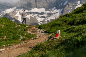 A hiking path to a snowy mountain region in Switzerland
