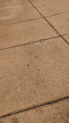 Concrete slabs forming geometric pattern on pavement