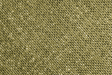 Upholstery khaki colored jacquard fabric diagonal coarse weave texture close up, macro. Textile background, furniture textile material, wallpaper, backdrop. Cloth structure close up, macro