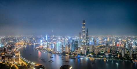 Fototapeta premium Stunning aerial view of Shanghai skyline at night