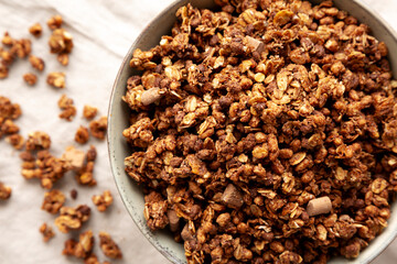 Homemade Healthy Chocolate Granola in a Bowl, top view.