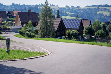 Rural Countryside Home with Solar Panels on a Sunny Day in Nature..