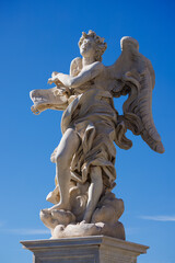 Angel with the Superscription by Gian Lorenzo Bernini and son Paolo on Ponte Sant'Angelo - Rome - Italy