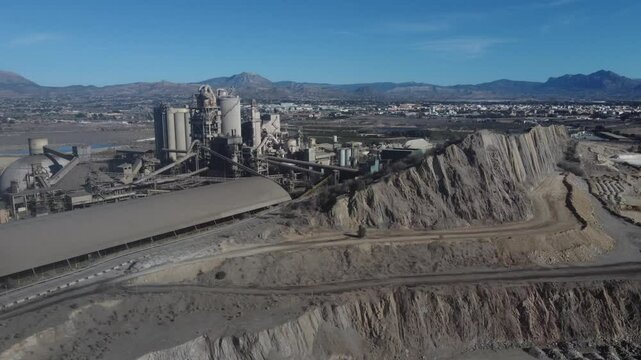 Orbiting around a quarry and a huge cement factory