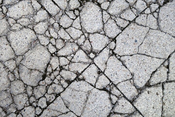 Cracked asphalt road texture.