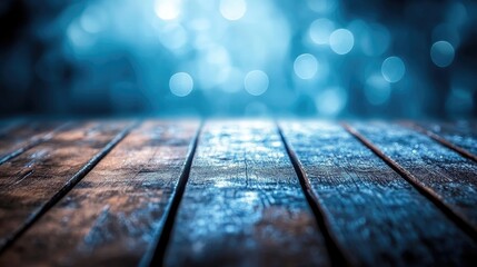 Wooden table with blue bokeh lights in background, abstract blurred dark wooden floor, copy space for product display