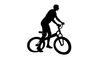 Fototapeta premium Silhouette of a man riding a bicycle