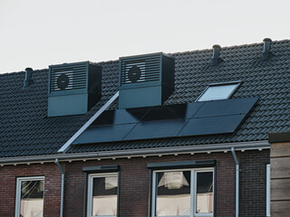 Modern row houses with integrated HVEC heat pumps on the roof in Assen, Netherlands