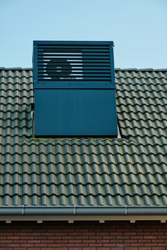 Modern a integrated HVEC heat pump on the roof of a urban house in Assen, Netherlands