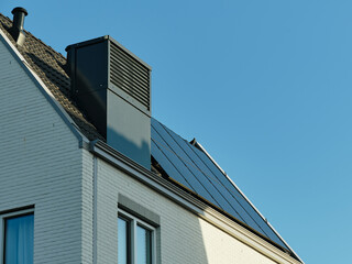 Modern house with integrated heat pump and solar panels on the roof in Assen, Netherlands